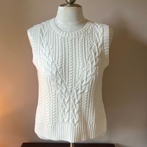 White sleeveless sweater